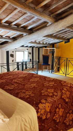 a bedroom with a large bed in a room at Casa Beatrice in Bolsena