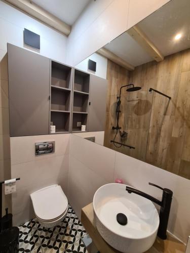Vonios kambarys apgyvendinimo įstaigoje Na Hamaku Jacuzzi & Sauna