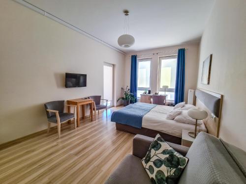 TV a/nebo společenská místnost v ubytování Antonińska Hotel & Apartamenty