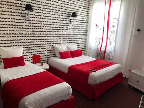 Postel nebo postele na pokoji v ubytování Hôtel Concorde