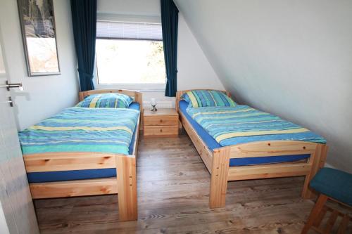 Tempat tidur dalam kamar di Haus Clara