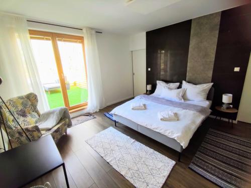 Ένα ή περισσότερα κρεβάτια σε δωμάτιο στο Apartman Loggia Park & Free Parking