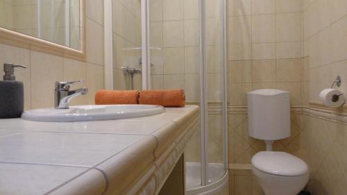Ett badrum på Gere Apartment de Luxe