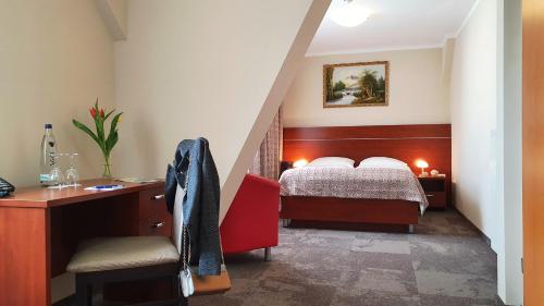 Postel nebo postele na pokoji v ubytování Hotel Atlas Halle