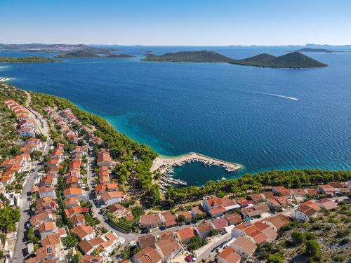 an aerial view of a resort near the water at Apartments Fijan in Drage