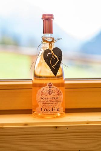 a bottle of cough syrup sitting on a window sill at STAUDACH - Alpinresidenz Zillertal in Ramsau im Zillertal