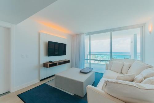 TV a/nebo společenská místnost v ubytování Radisson Blu Aruba