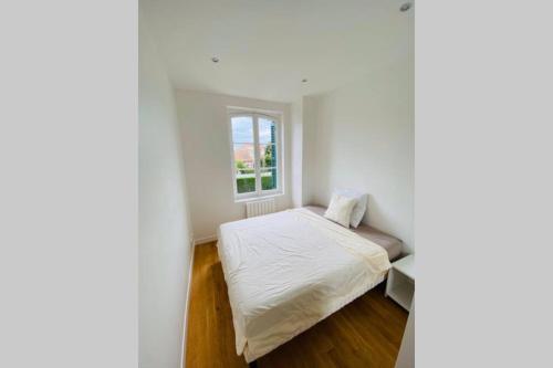 Cama ou camas em um quarto em Deauville Prestige - Chic, Confort & Tout à Pied