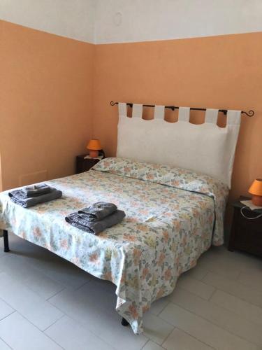 Una cama o camas en una habitación de Cascina la Barona