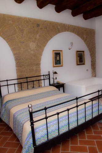 B&B Corte Catalanaにあるベッド
