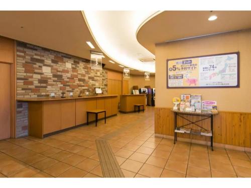 a waiting area of a restaurant with a white board at R&B Hotel Nagoya Nishiki - Vacation STAY 15171v in Nagoya