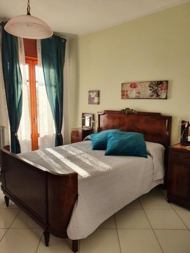 Ένα ή περισσότερα κρεβάτια σε δωμάτιο στο B&B Casa di Donna