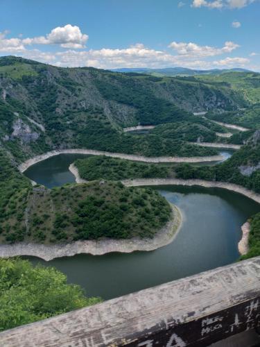 an aerial view of a river and mountains at Etno domacinstvo Uvacki konaci in Nova Varoš