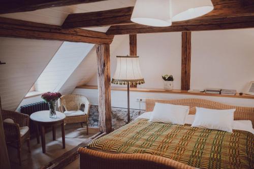 Llit o llits en una habitació de Fotogrāfa Apartamenti