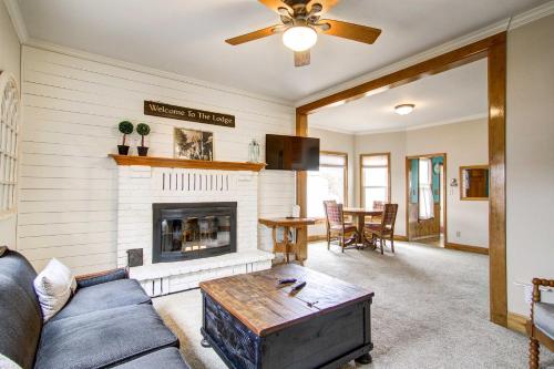 a living room with a couch and a fireplace at Monument Retreat - Walk to Local Dining and Shopping in Monument