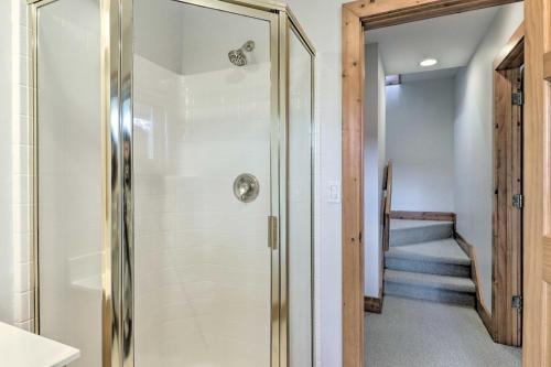 a bathroom with a shower and a staircase at Sapphire Retreat with 2 Decks, Views and Resort Access in Sapphire