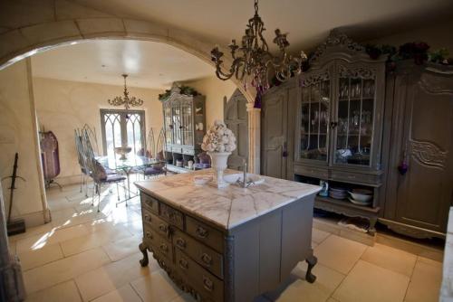 a large kitchen with a island in the middle of a room at Manor Court in Newark upon Trent