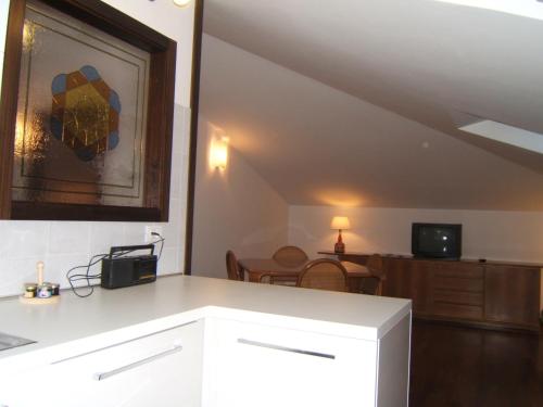 a kitchen and living room with a dining room at Greatview Narni in Narni