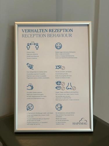 a sign for a magnification magnification restoration facility at Hapimag Apartments London in London