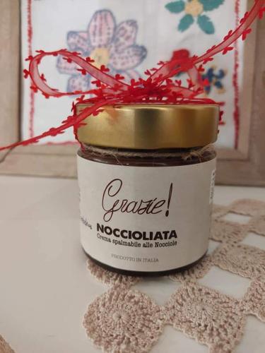 a jar of pasta noocatoilli sitting on a table at Agriturismo Etico Le Grazie in Bevagna