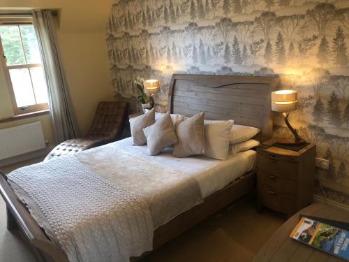 A bed or beds in a room at Ach-Na-Sidhe 