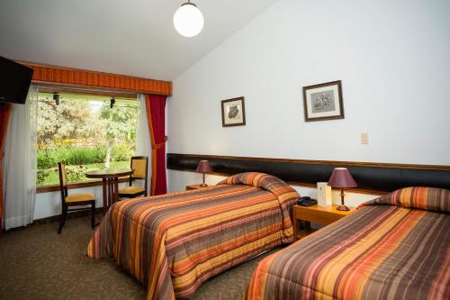 Posteľ alebo postele v izbe v ubytovaní Club Hotel Centro de Convenciones Cusco