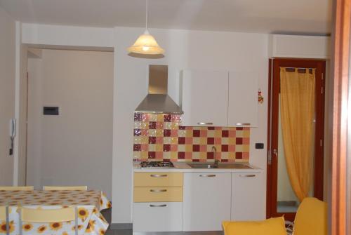 A cozinha ou cozinha compacta de I Portici Apartments