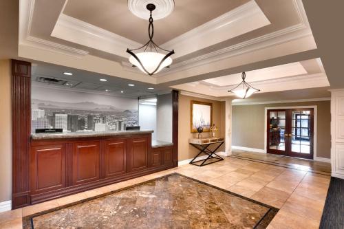 a lobby with a bar in a building at Best Western Downtown Phoenix in Phoenix