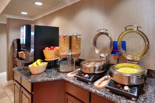 a kitchen with some food on a counter at Best Western Downtown Phoenix in Phoenix