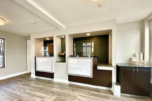 a hair salon with two sinks in a room at Travelodge Inn & Suites by Wyndham Missoula University Park in Missoula