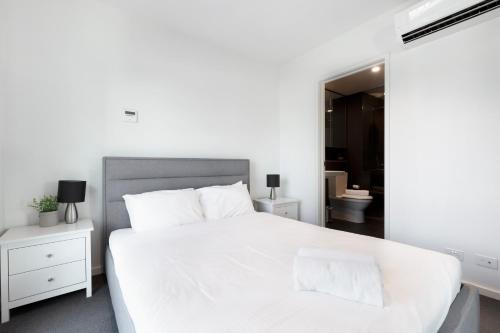 Ένα ή περισσότερα κρεβάτια σε δωμάτιο στο KULA Docklands O