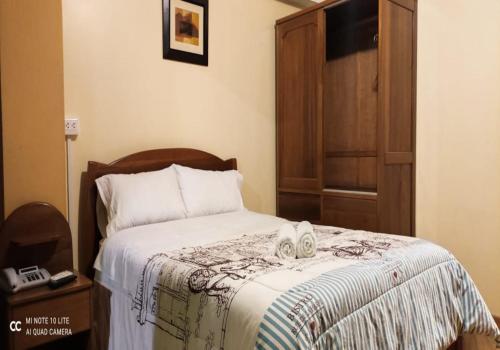 Postel nebo postele na pokoji v ubytování Hotel Don Sam