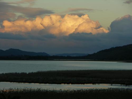 a storm cloud over a body of water at Beside Still Waters in Wilderness