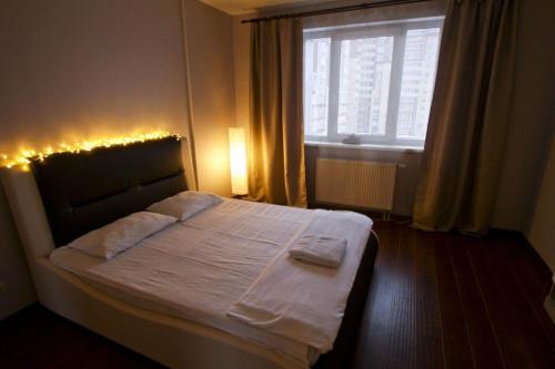 Cama o camas de una habitación en Centre Apartments - Surgut