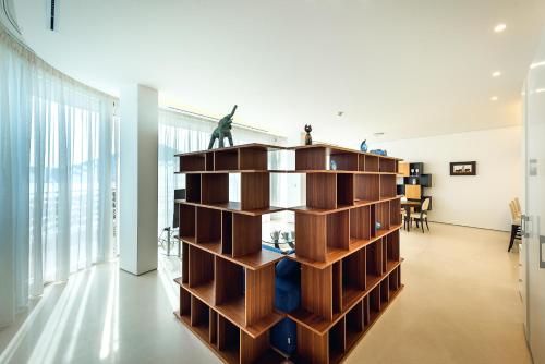 a large wooden book shelf in a room at Sea View Villas in Duklei in Budva