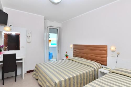 Ein Bett oder Betten in einem Zimmer der Unterkunft Hotel Mexico