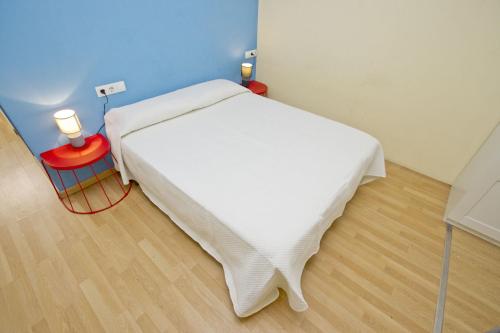 Cama o camas de una habitación en Barcelona City Apartment