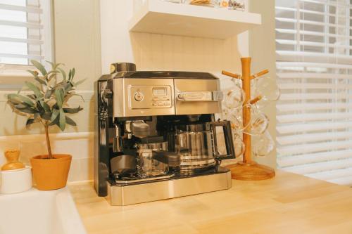 a coffee maker sitting on top of a counter at The Woodlawn Tudor in Hot Springs
