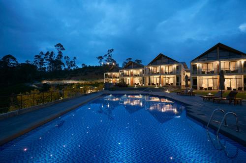 a large swimming pool in front of a building at The Argyle Luxury Boutique in Hatton