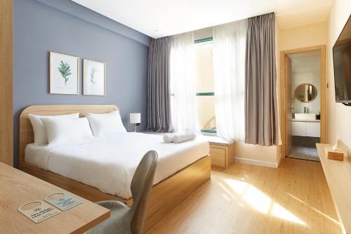 Katil atau katil-katil dalam bilik di Larimar Villas Cô Giang