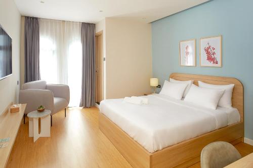 Katil atau katil-katil dalam bilik di Larimar Villas Cô Giang