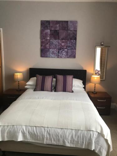 Katil atau katil-katil dalam bilik di Endeavour Guest House