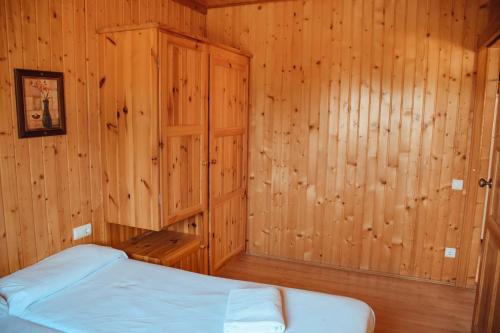 Ένα ή περισσότερα κρεβάτια σε δωμάτιο στο Camping La Aldea