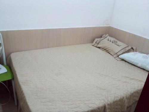 เตียงในห้องที่ Casa Do Junior Na Prainha Em Arraial Do Cabo