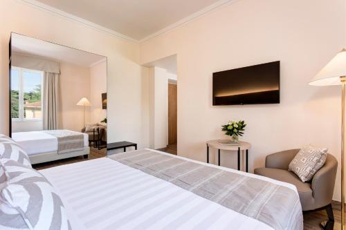 Katil atau katil-katil dalam bilik di Grand Hotel Arenzano