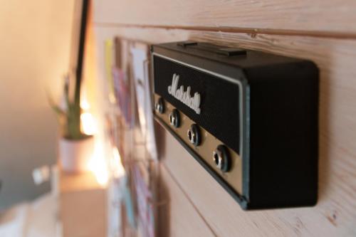 a black electrical outlet on a wall at Daft Hotel in Malmedy