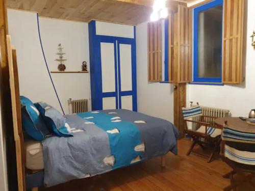 Una cama o camas en una habitación de B & B Les Secrets des Loges