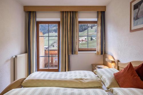 Ένα ή περισσότερα κρεβάτια σε δωμάτιο στο Apartment Edelweiß Oberachrain