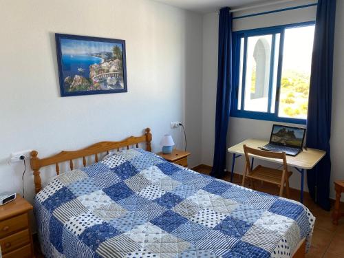 A bed or beds in a room at Perla Blanca 3