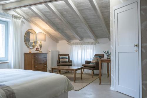 Posteľ alebo postele v izbe v ubytovaní Acqua di Civita Beauty & Rooms